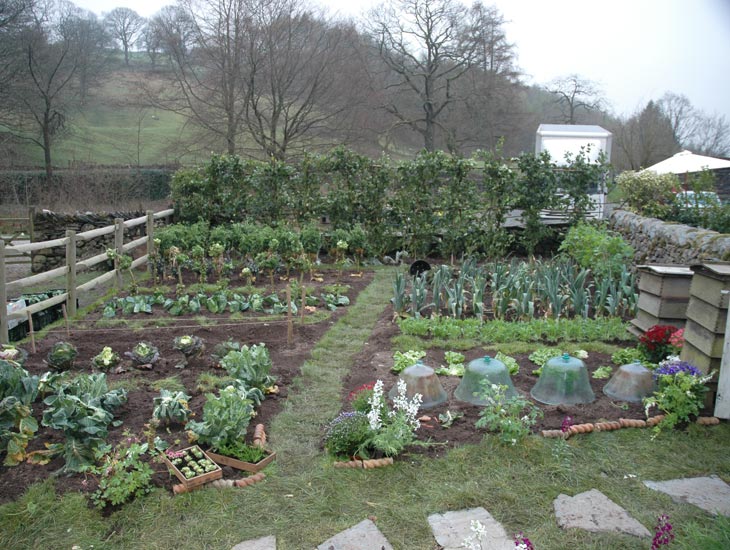 45 tonnes of topsoil, specially grown vegetables, a few period props and silk flowers were used to create this look of a period summer vegetable garden, in March.